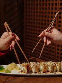 Chopsticks resting on a sushi meal, Japan dining etiquette